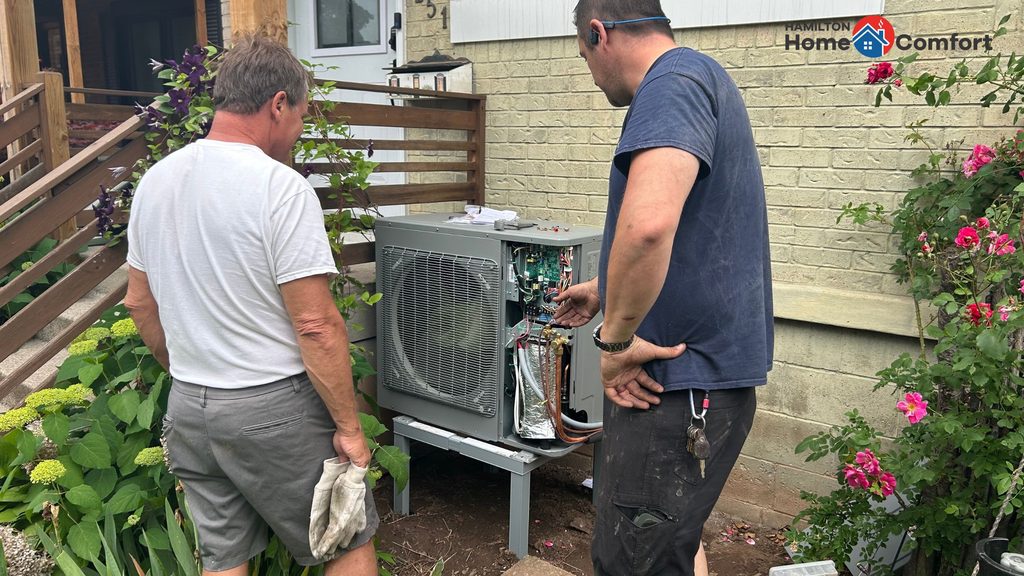 Reviewing maintenance on a heat pump in Ontario - Hamilton Home Comfort.